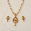Golden Floral Teardrop Pendant Set with Matching Earrings