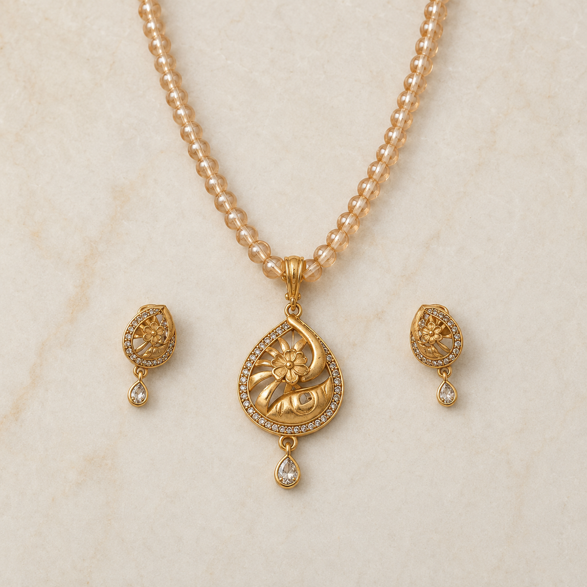 Golden Floral Teardrop Pendant Set with Matching Earrings