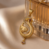 Golden Paisley Pendant Set with Matching Earrings