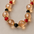 Champagne Beaded Necklace with Red & Black Accents
